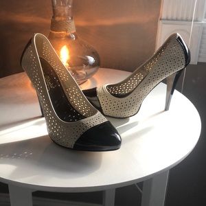 Ivory and black pumps